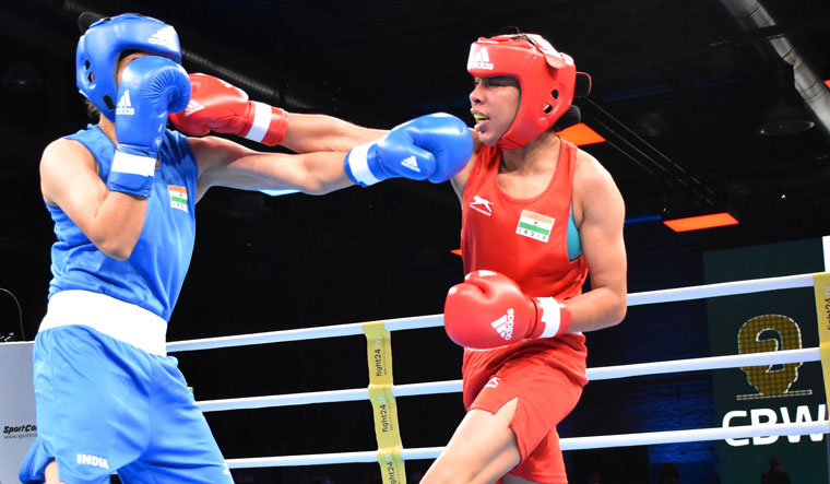 Forward punch: Manisha Moun (in red) in action against compatriot sakshi chaudhary in the 57kg category finals at the cologne boxing world cup, Germany, in December 2020