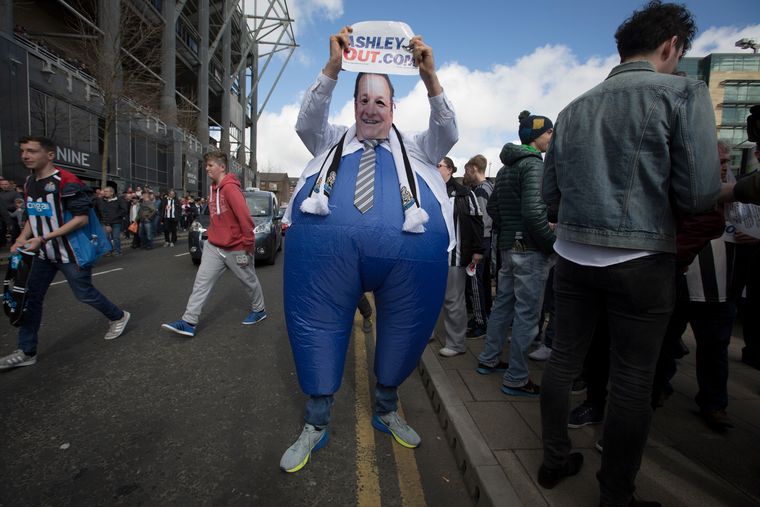 Frayed ties: A protester dressed as newcastle united owner Mike Ashley, outside the club stadium | Getty Images