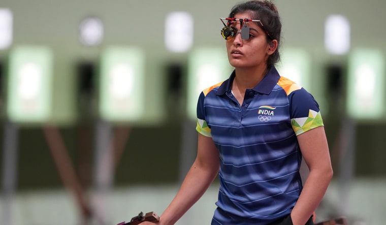 Off target: Manu Bhaker takes a breather during her 10m air pistol event | PTI