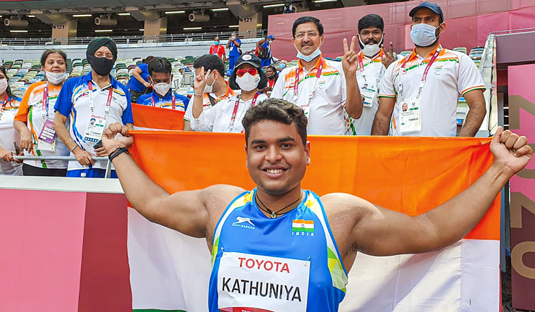 ogesh Kathuniya, discus throw. When he was young, his mother would strap him to her scooter and take him for physiotherapy sessions for a neurological disorder | PTI