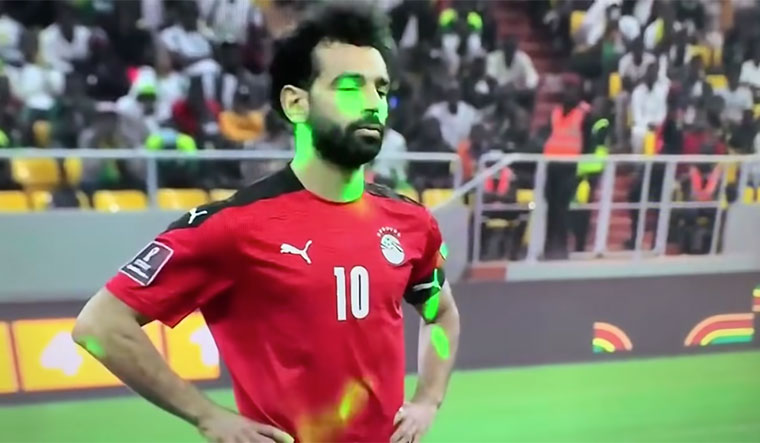 Egypt lost to Senegal on penalties and failed to qualify. Salah missed his penalty after Senegal fans directed laser lights on to his face (video grab).