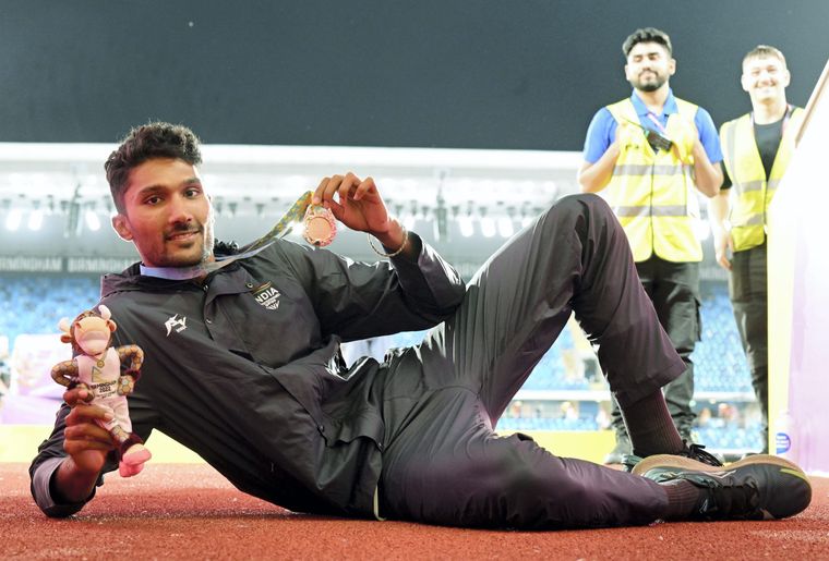 Tejaswin Shankar celebrates after winning the bronze medal in men’s high jump | PTI