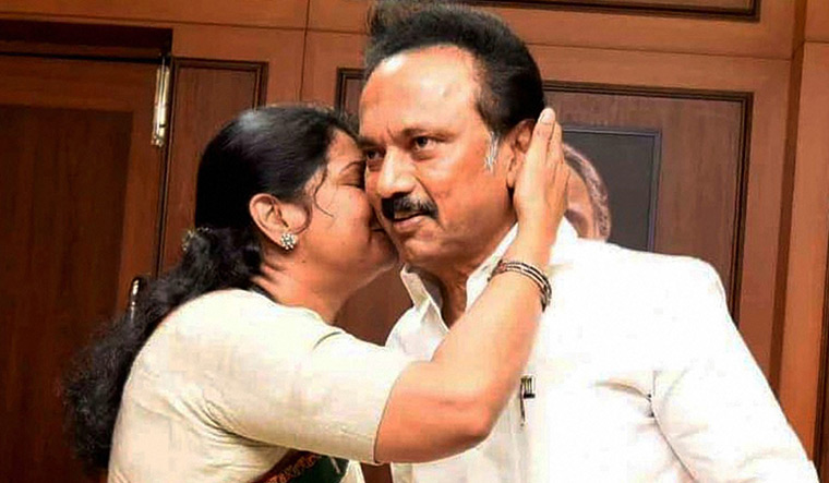 [FIle] Kanimozhi greets her brother M.K. Stalin after the latter was chosen as DMK's president | PTI
