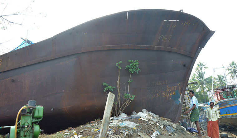 House arrest: A boat, at a boatyard in Munambam, that was seized in 2008 by Tamil Nadu police on charges of being built for the LTTE. Though the boatyard owner was cleared, the boat was not released | Manoj Vilson