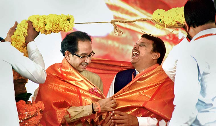 No laughing matter: Shiv Sena leader Uddhav Thackeray with Chief Minister Devendra Fadnavis. The Sena and the BJP’s last-minute seat-sharing agreement has made rebels out of many ticket aspirants | PTI