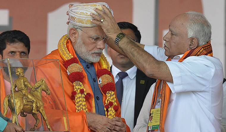 No Headwinds?: Yeddyurappa says the Modi wave is stronger now than it was in 2014 | AFP
