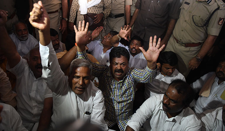 Bitter feud: BJP MLAs protest after rebel MLA K. Sudhakar was allegedly held captive by Congress leaders after his resignation | Bhanu Prakash Chandra