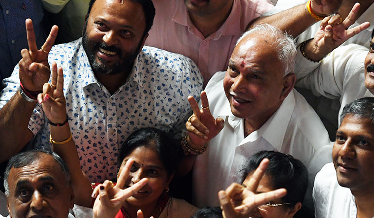 Back on top: Yeddyurappa celebrates after the Congress-JD(S) government lost the trust vote in the Karnataka assembly | Bhanu Prakash Chandra