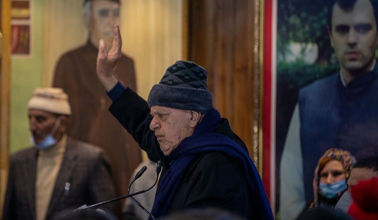 Back in action: National Conference president Farooq Abdullah with party workers | AP
