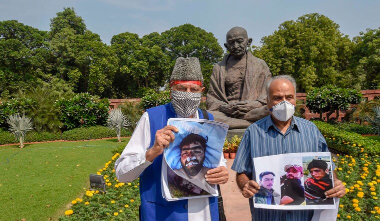 In search of justice: National Conference leaders Farooq Abdullah and Hasnain Masoodi protesting the fake encounter (file picture) | PTI
