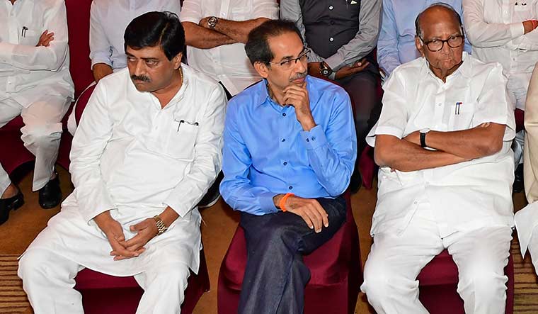 Points to ponder: Chief Minister Uddhav Thackeray flanked by NCP chief Sharad Pawar (right) and PWD Minister Ashok Chavan at a meeting in Mumbai | Amey Mansabdar