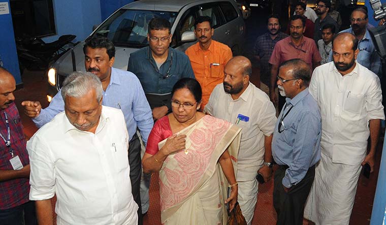 On ground: Health minister K.K. Shailaja with ministers A.C. Moideen (left) and V.S. Sunil Kumar (right) at the Thrissur medical college where the first case was confirmed | Jeejo John