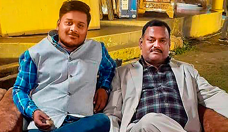 Vikas Dubey (right) with his aide Amar Dubey during an event. Amar was killed in an encounter at Maudaha village | PTI