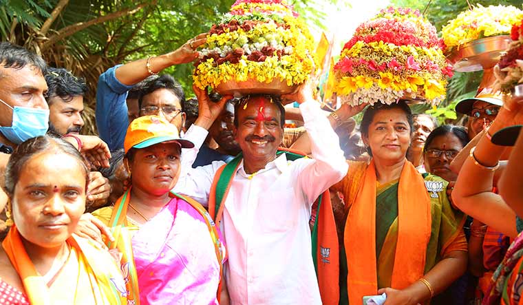 Big fight: BJP candidate in Huzurabad Eatala Rajender celebrating Bathukamma festival.