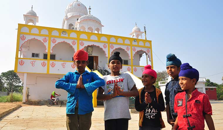 Guiding light: Children in front of the gurdwara in Gachubhai Thanda | P. Prasad