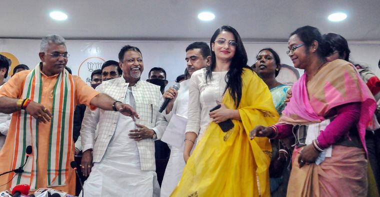 Joining forces: State BJP president Dilip Ghosh and BJP national vice president Mukul Roy at an event felicitating new party members—actor Tanusree Chakraborty and former TMC MLA Sonali Guha | PTI