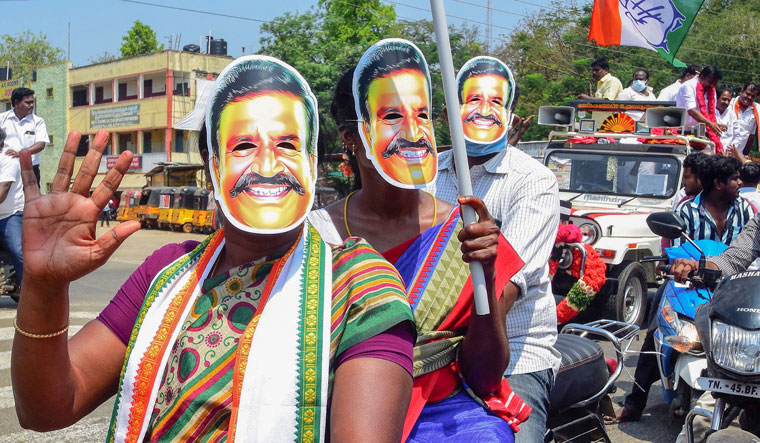United we stand: Supporters of the DMK and the Congress campaign for their candidate K.N. Nehru in Tiruchirappalli | PTI