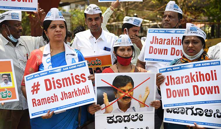 Shameful exit: AAP supporters staging a protest against Ramesh Jarkiholi | Bhanu Prakash Chandra