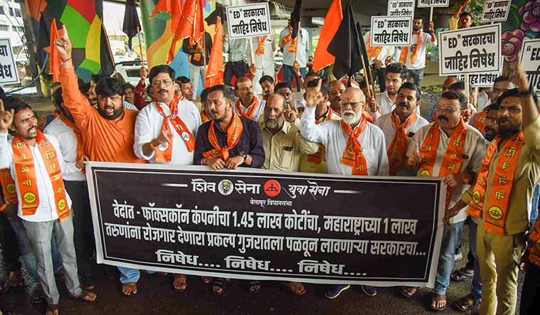 Ire, fire: Uddhav Thackeray loyalists raise slogans against the state government over shifting of Vedanta-Foxconn project to Gujarat at Turbhe in Navi Mumbai | PTI