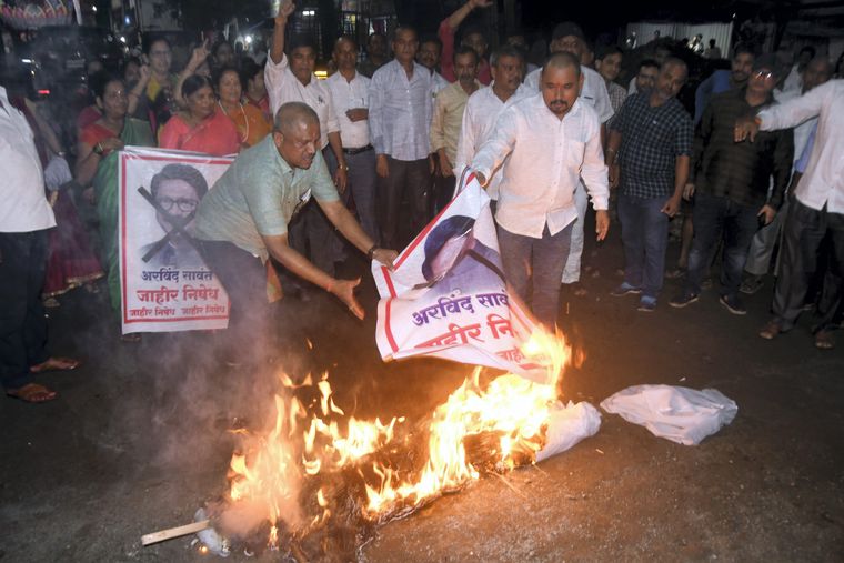 People protest against Shiv Sena leader Arvind Sawant in Thane over his remarks about Champa Singh Thapa, former aide of Shiv Sena founder Bal Thackeray, after Thapa joined the Shinde faction | PTI
