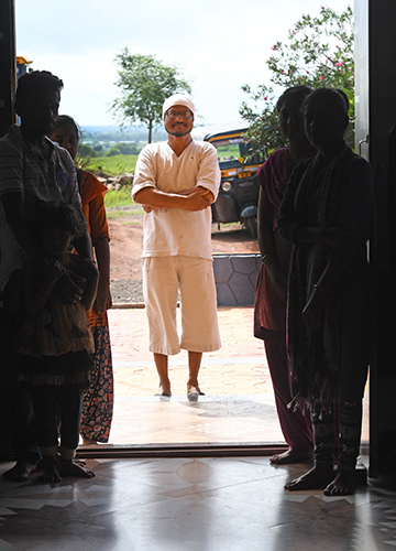 Home maker: Ravi Bapatle at Happy Indian Village, Latur, with members of the community he has created.