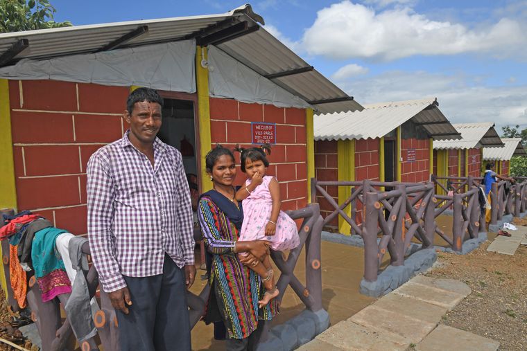 An HIV-positive couple whose daughter, Khushi, is HIV negative.