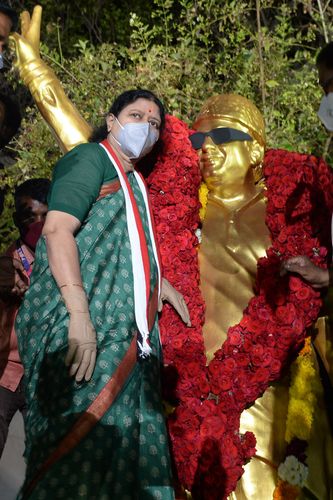 Back on the road: V.K. Sasikala near a statue of MGR. After a year of silence, she recently held a roadshow | AFP