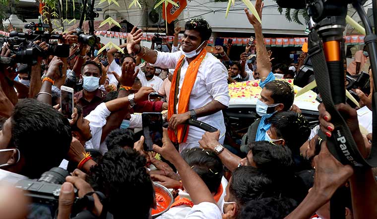 Uneasy smile: AIADMK leaders have criticised Annamalai for comparing himself with Jayalalithaa | R.G. Sasthaa