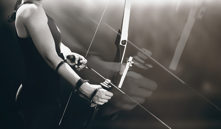 Sportswoman-practicing-archery-target-arrow-shut
