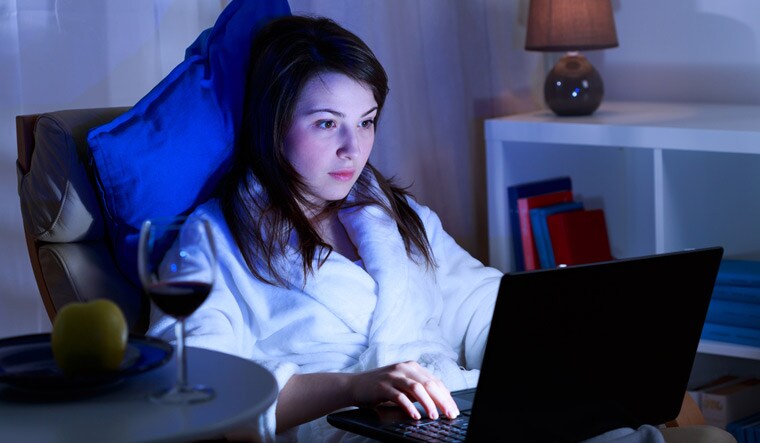 girl--laptop-relaxing-reading-working-night-