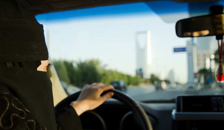 Saudi-woman-driving-car-shut