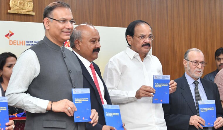Jayant Sinha, MOS Civil Aviation; G.M. Rao, chairman, GMR Group; M. Venkaiah Naidu, Vice President; and Anil Baijal, LG Delhi during the release of a report on Delhi airport at the vice president's residence in New Delhi | Arvind Jain