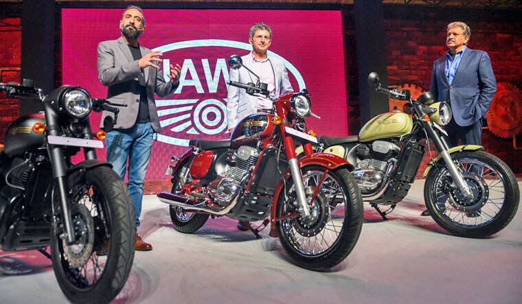 (L-R) Classic Legends Pvt Ltd. and Phi Capital Management Founder Anupam Thareja, Rustomjee group CMD Boman Irani and Mahindra group Chairperson Anand Mahindra during the launch event of Jawa bike models 'Jawa, Jawa 42, and Jawa Perak', in Mumbai on Thursday | PTI