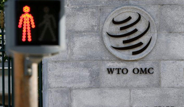 World Trade Organization (WTO) logo pictured on their headquarters in Geneva, Switzerland | Reuters
