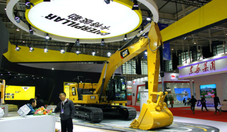 CATERPILLAR-CHINA/B&R, A Caterpillar excavator is displayed at the World Intelligent Manufacturing Summit