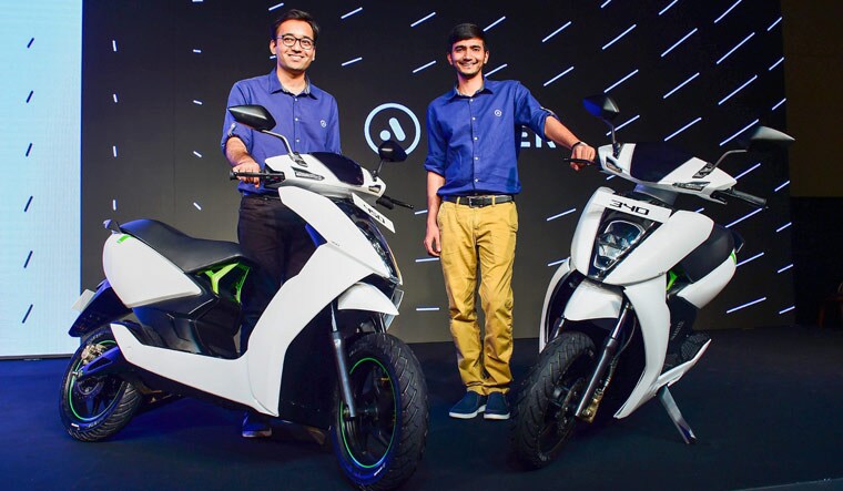Ather Energy co-founders Tarun Mehta (left) and Swapnil Jain during the launch of the electric scooter Ather 450 | Reuters