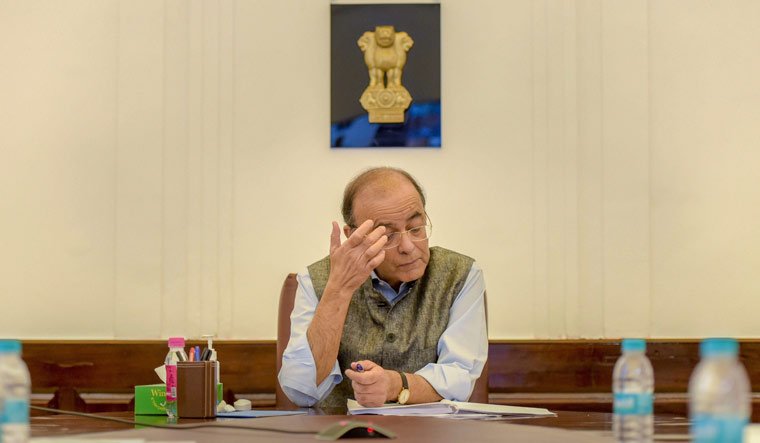 Finance Minister Arun Jaitley during the GST council meeting via video conferencing at North Block, in New Delhi | PTI