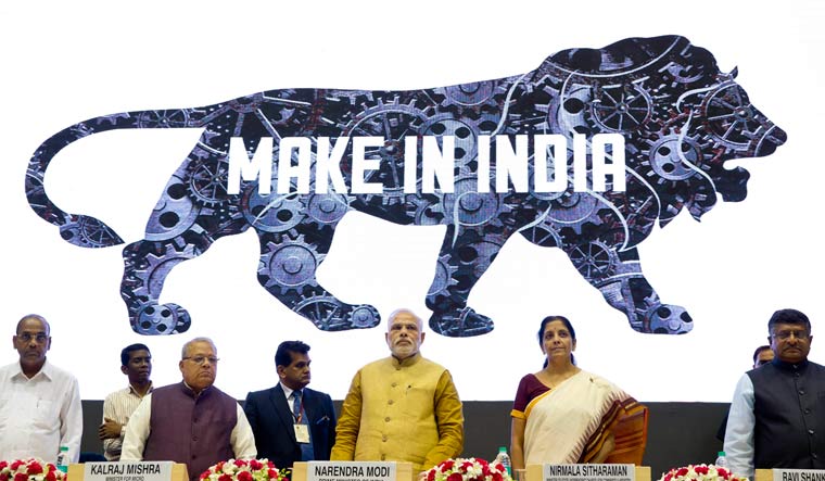 [File] Prime Minister Narendra Modi unveils the logo of 'Make in India' initiative in New Delhi on September 25, 2014 | AP