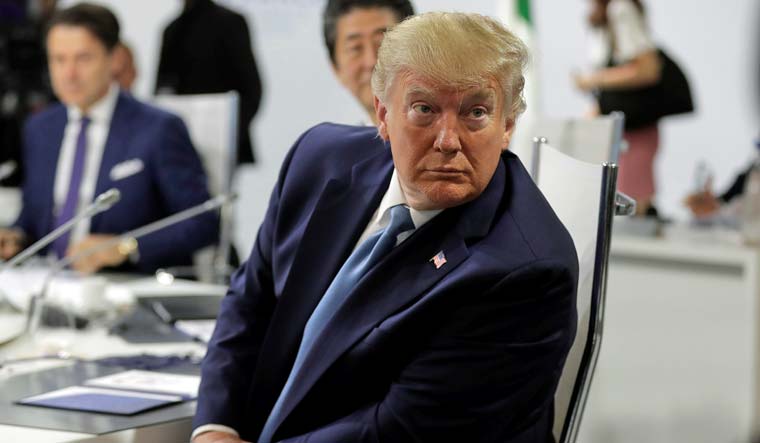 Ahead of G7 summit, Trump signals some regret on China trade war