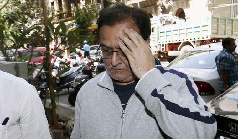Yes Bank founder Rana Kapoor arrives at the Enforcement Directorate office after leaving Sessions Court for alleged money laundering charges in Mumbai | Reuters