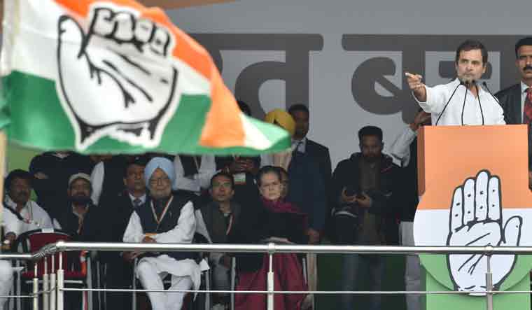 Congress leader Rahul Gandhi gestures as he speaks during an election campaign rally ahead of Assembly polls in Mahendergarh district of Haryana | PTI