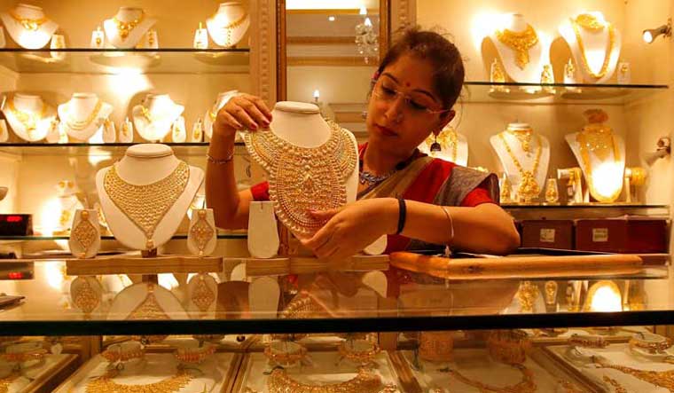 With the increase in customs duty, coupled with a 3 per cent GST, the overall taxes on gold will come to 15.5 per cent | Reuters