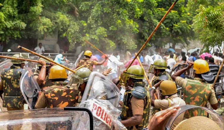 [File] Police personnel baton charge at protesters who were demanding the closure of Vedanta's Sterlite Copper unit in Thoothukudi | PTI