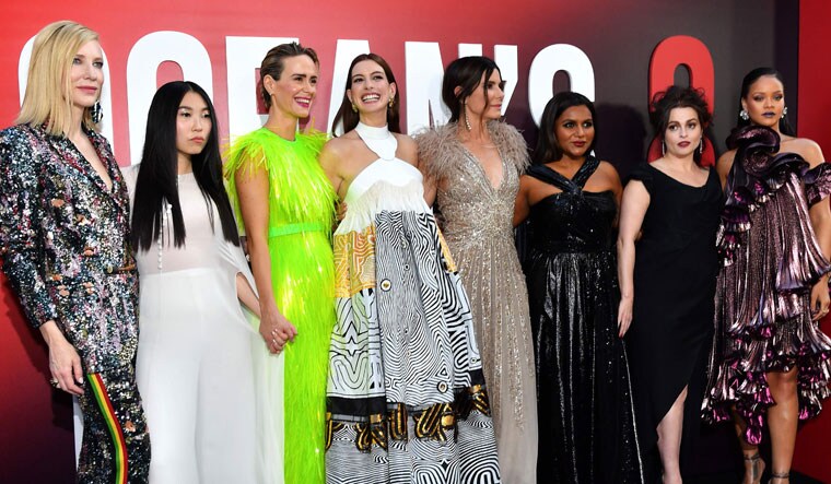 (From left to right) Cate Blanchett, Awkwafina, Sarah Paulson, Anne Hathaway, Sandra Bullock, Mindy Kaling, Helena Bonham Carter and Rihanna at the World Premiere of Ocean's 8 on June 5 | AFP