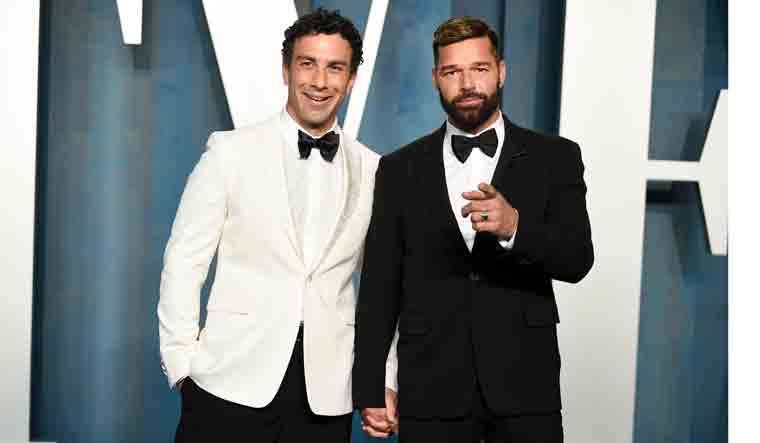 Jwan Yosef, left, and Ricky Martin appear at the Vanity Fair Oscar Party in Beverly Hills | AP