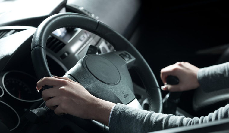 car-driving-driver-woman-steering-shut