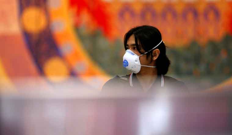 The WHO defines a pandemic as "an outbreak of a new pathogen that spreads easily from person to person across the globe" | Reuters 