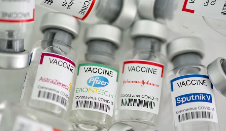 Vials labelled "AstraZeneca, Pfizer - Biontech, Johnson&Johnson, Sputnik V coronavirus disease (COVID-19) vaccine | Reuters