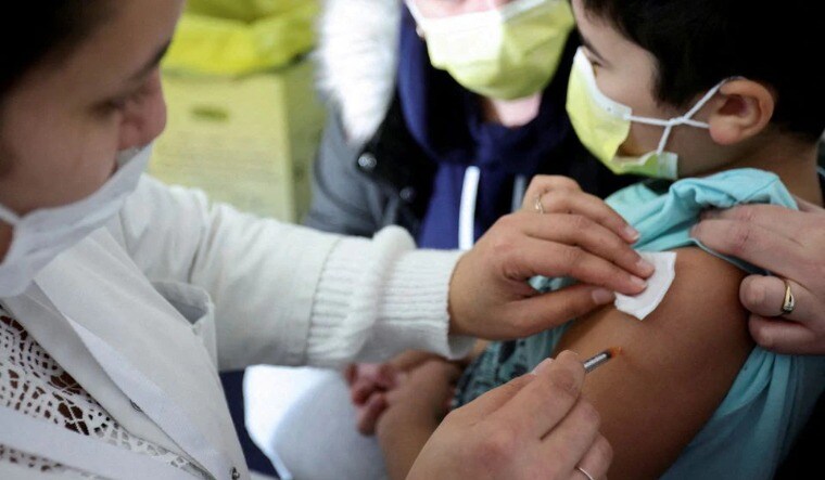 covid-19-vaccine-dose-coronavirus-vaccine-child-reu