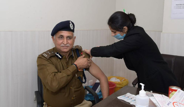 S.N. Srivastava, Commissioner of Police, Delhi receives vaccine against COVId-19 